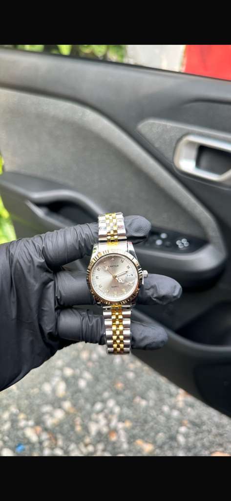 Tommy Hilfiger and Cartier women's watches Woman