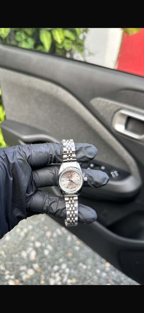 Tommy Hilfiger and Cartier women's watches Woman